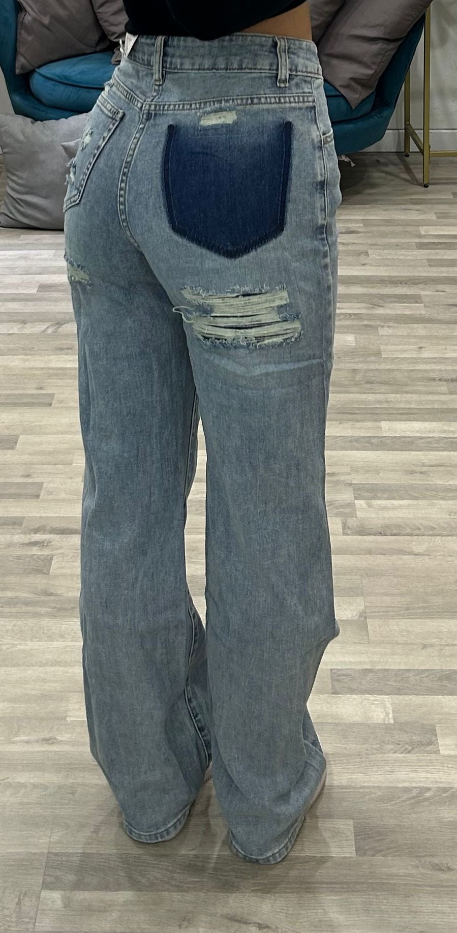 jeans con tasca di un altro colore