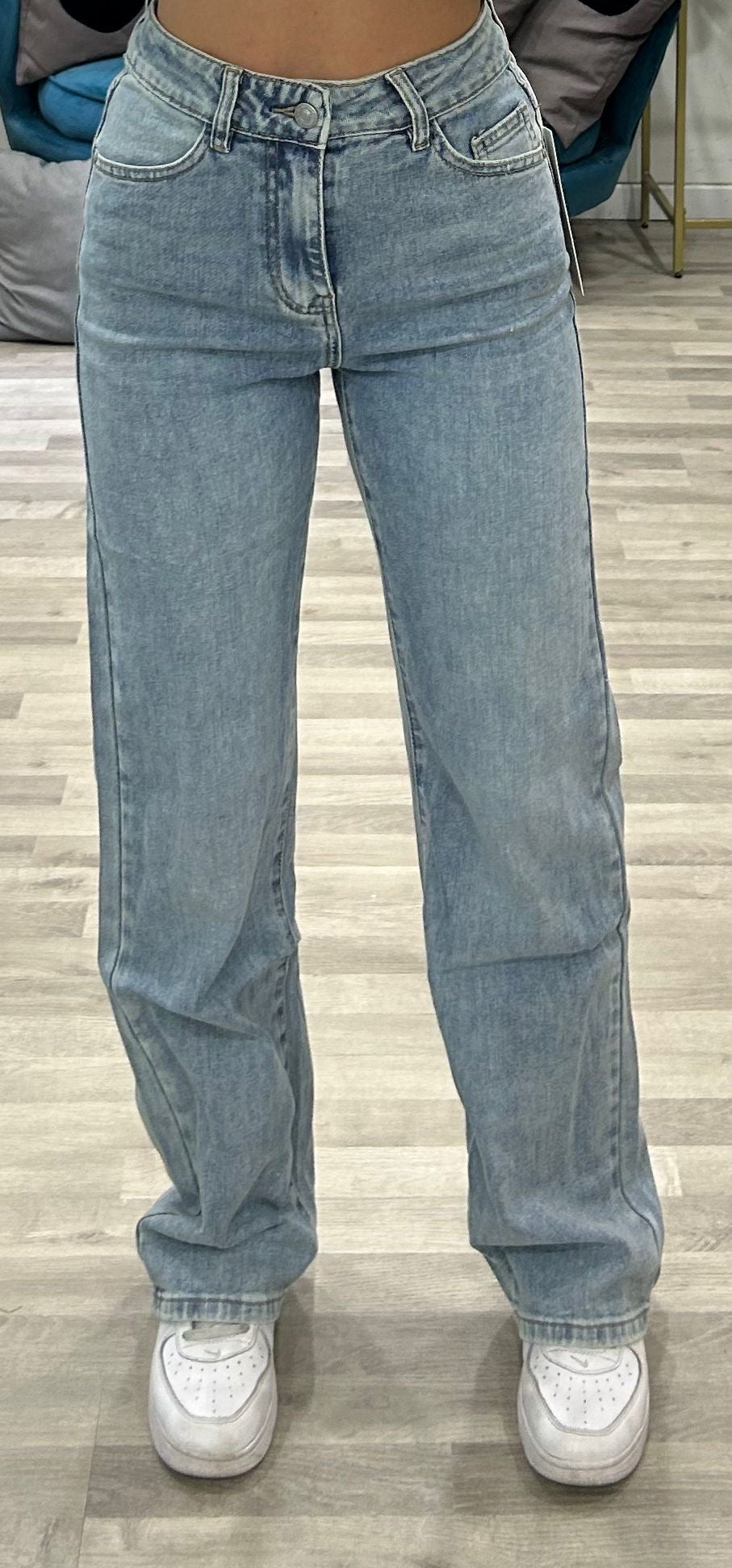 jeans con tasca di un altro colore