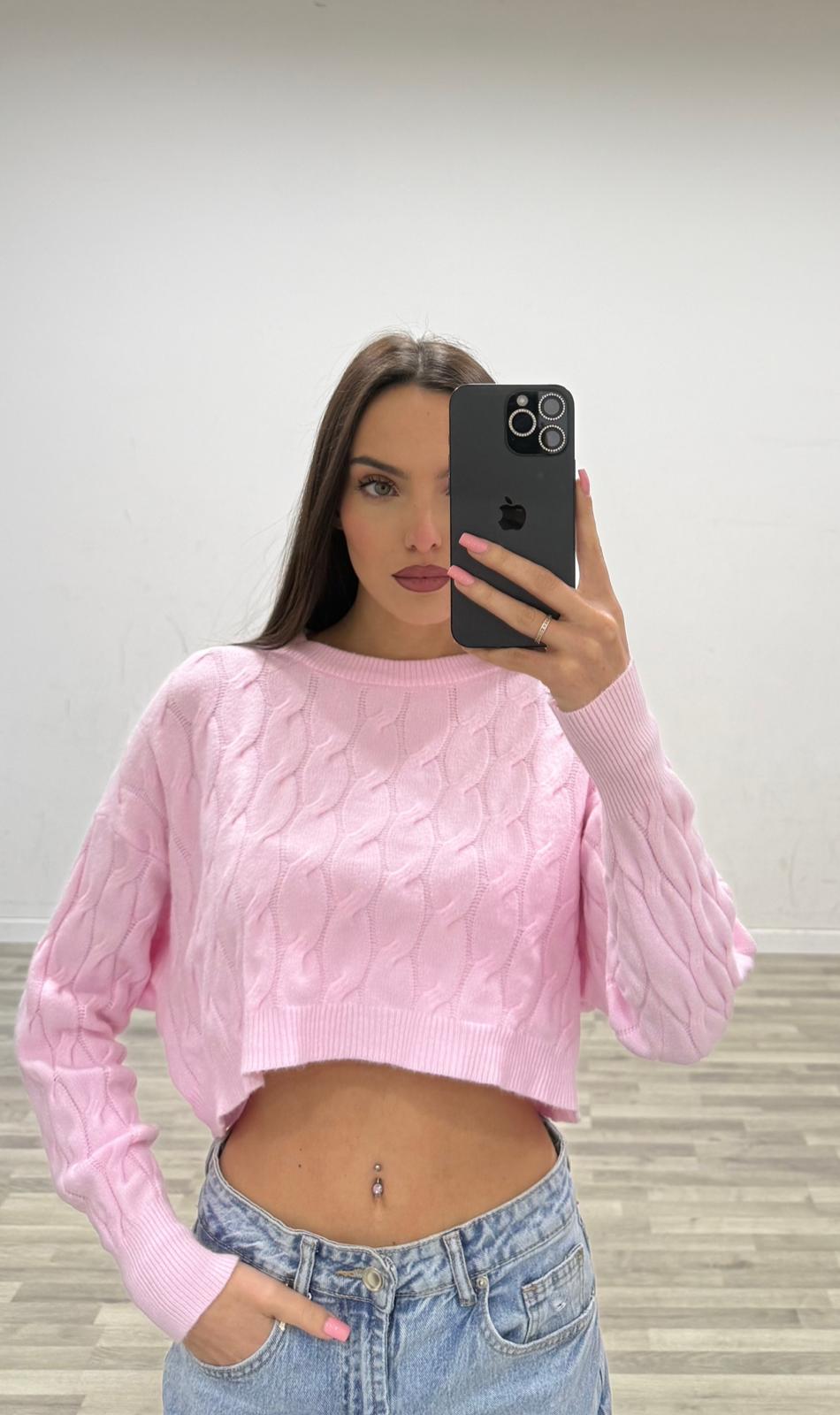 pull corto con treccie