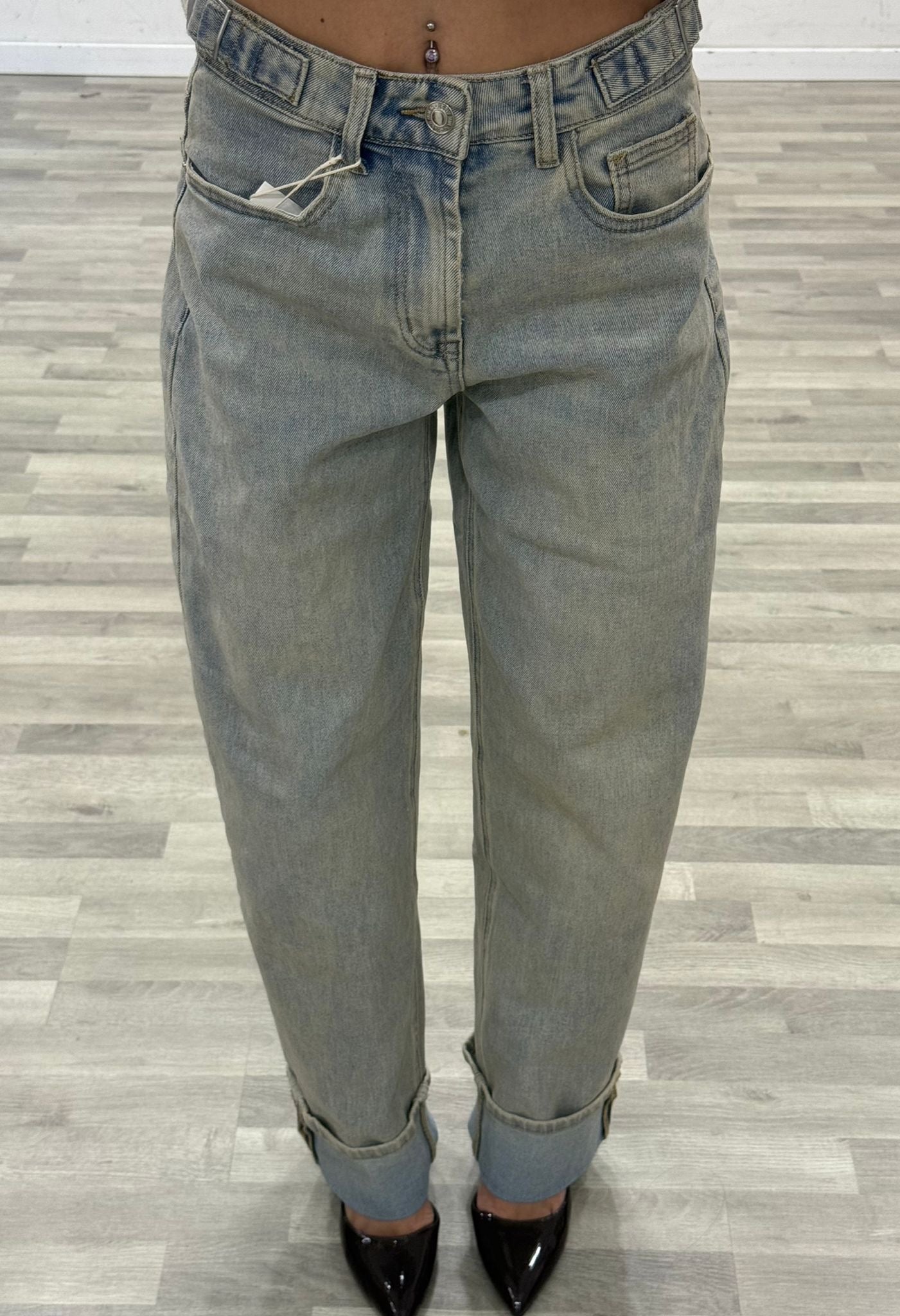 jeans con fibbie sabbiato