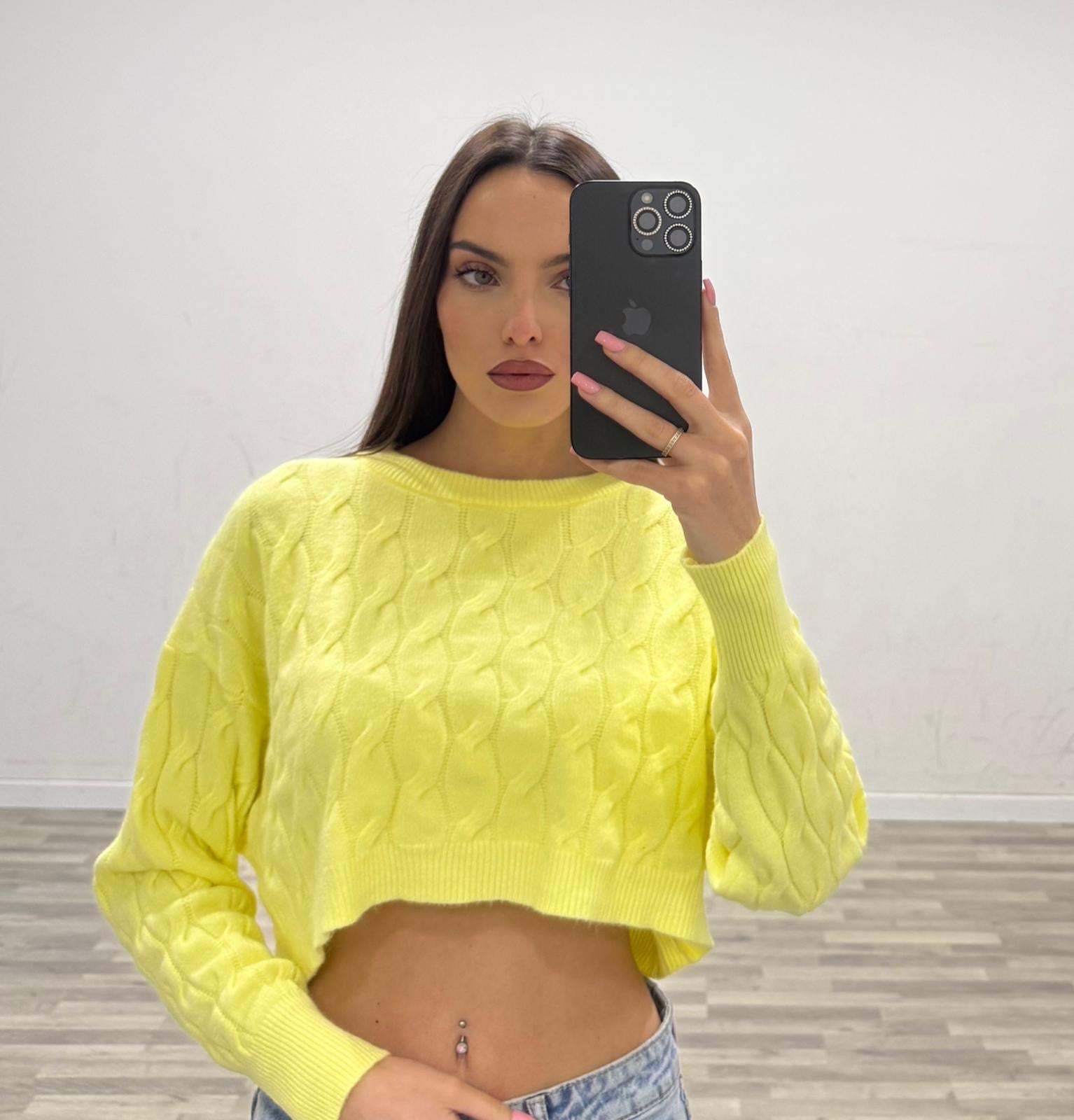 pull corto con treccie