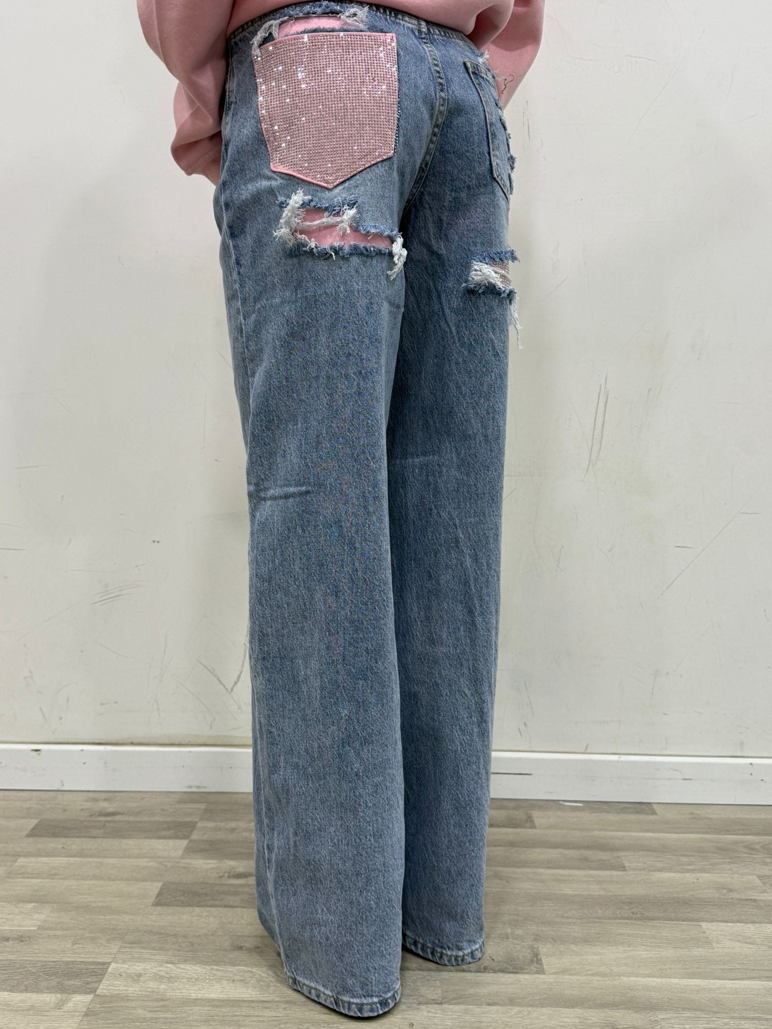 jeans con tasca in strass rosa