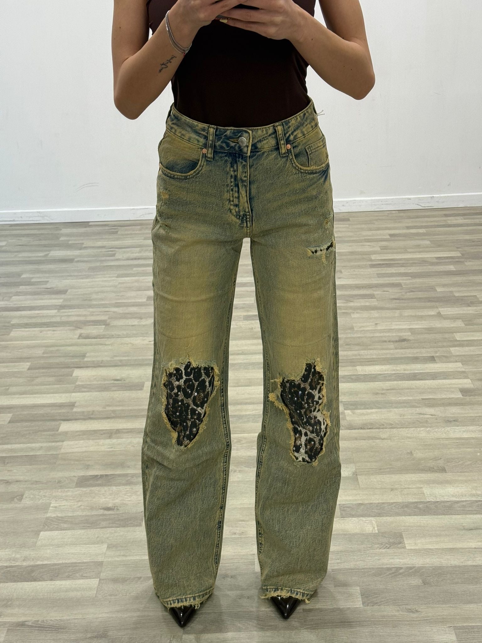 jeans sabbiato e maculato