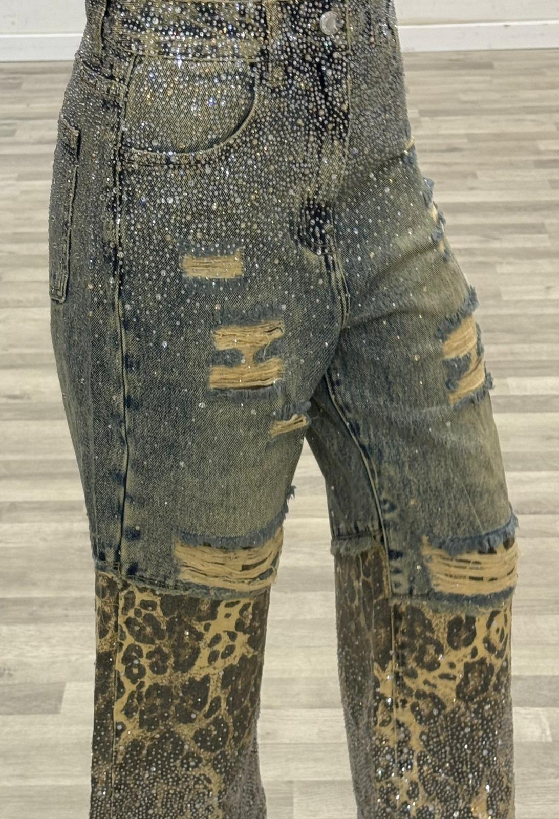 jeans con strappi sabbiato