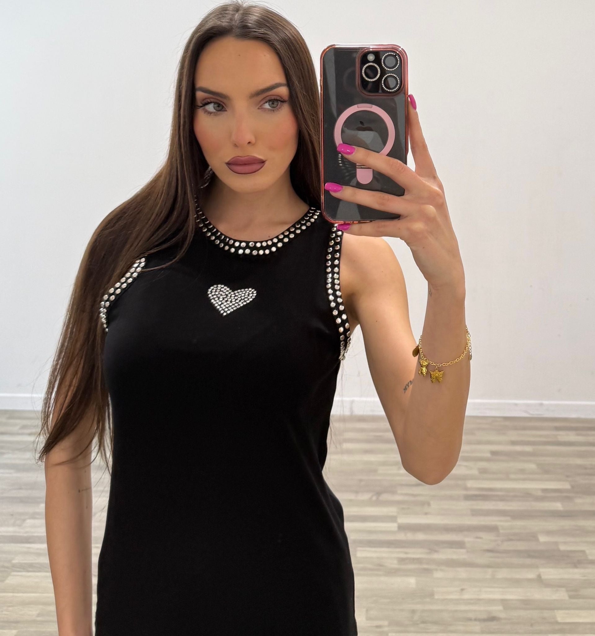 canotta costine con borchiette