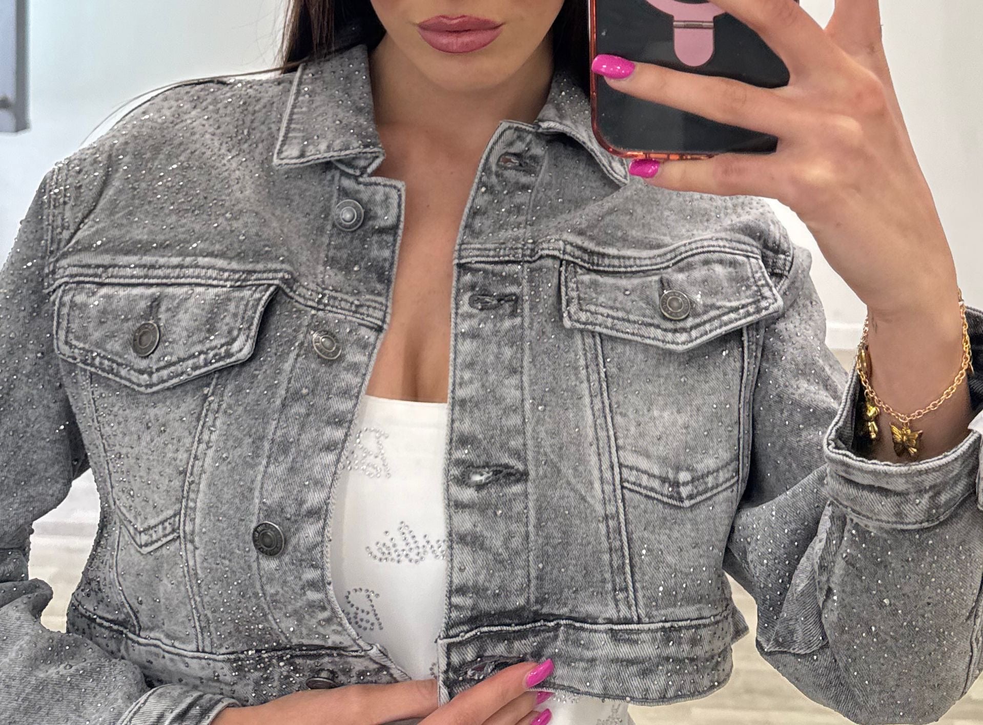 giubbino di jeans grigio con brillantini