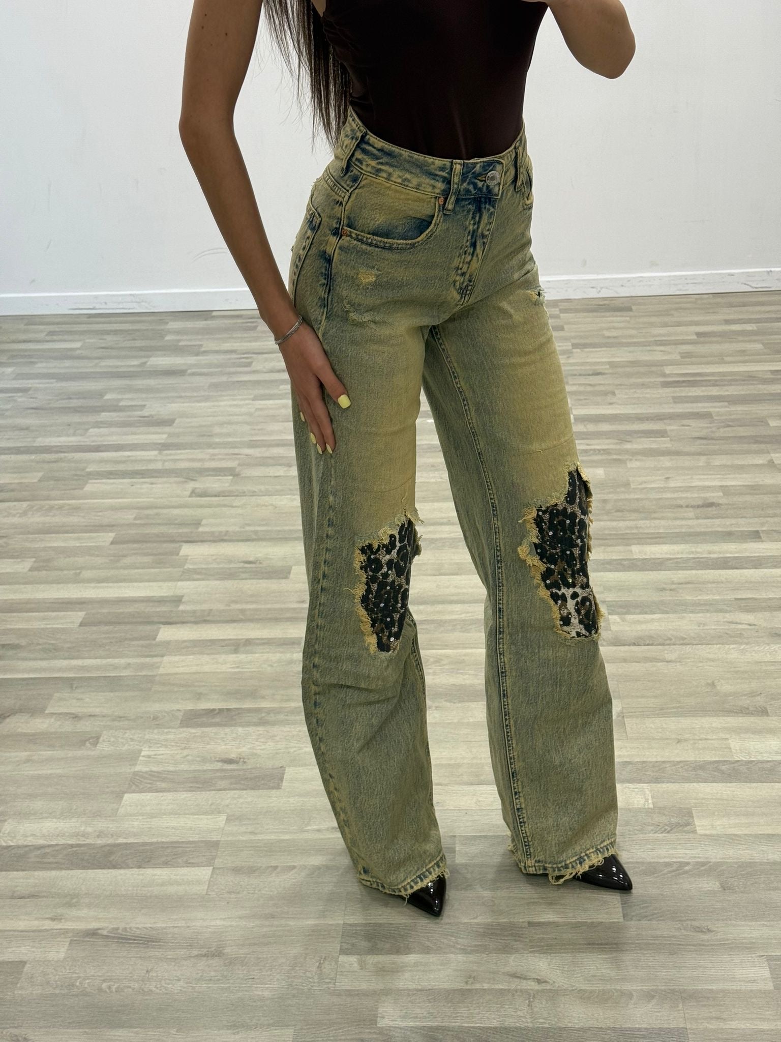 jeans sabbiato e maculato