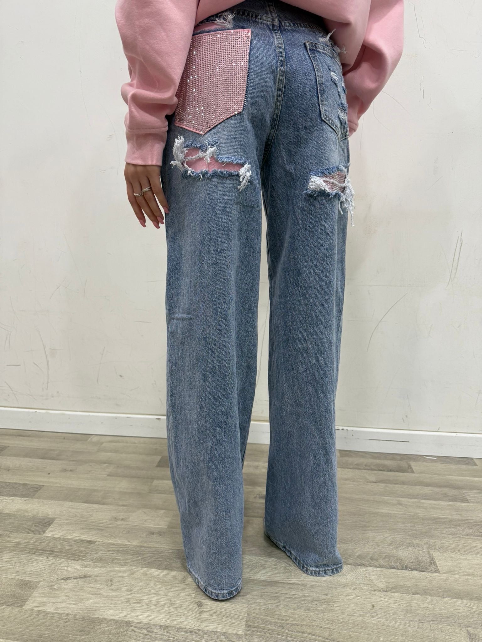 jeans con tasca in strass rosa