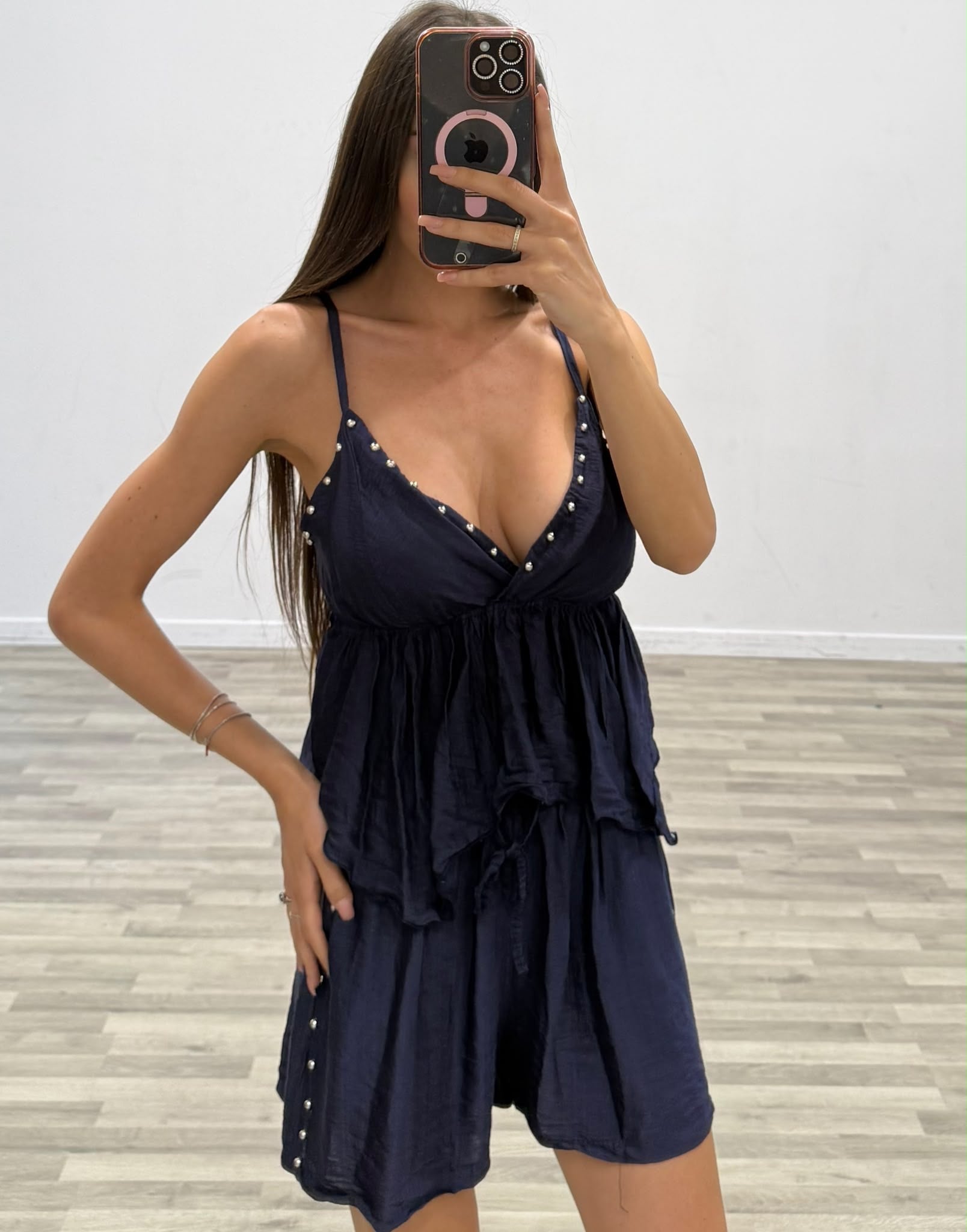 completo top e short con borchiette