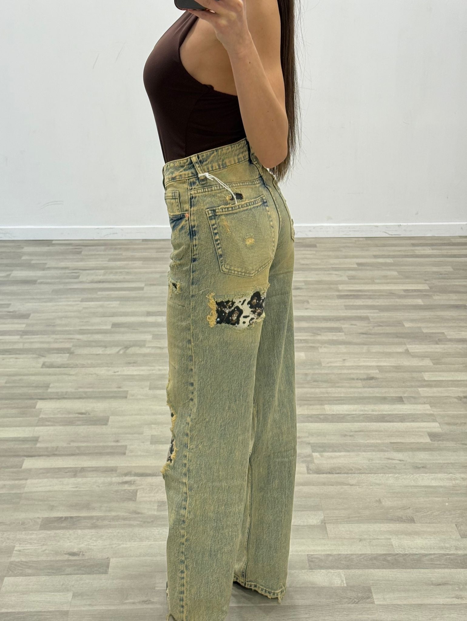jeans sabbiato e maculato
