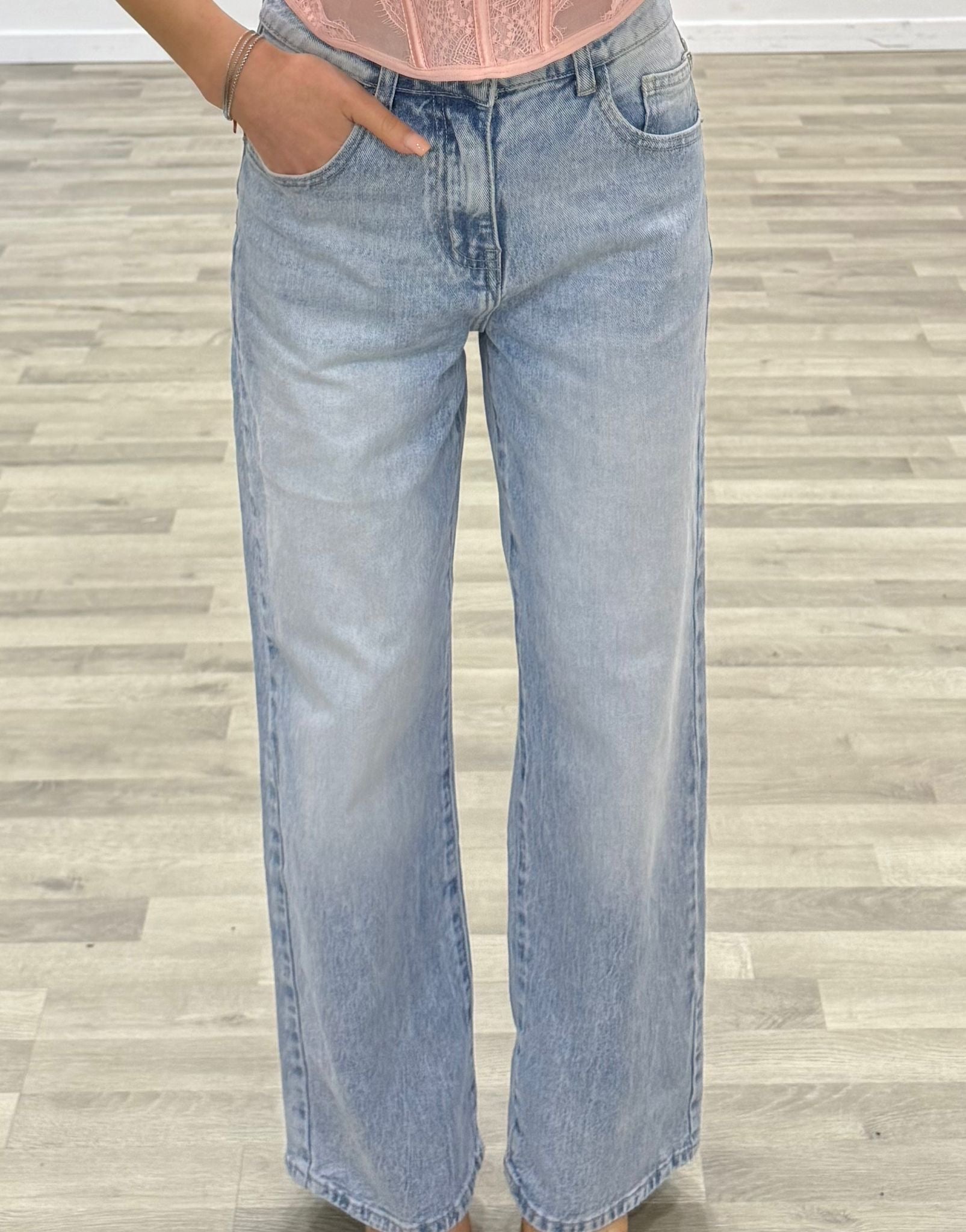jeans con new tasca rosa