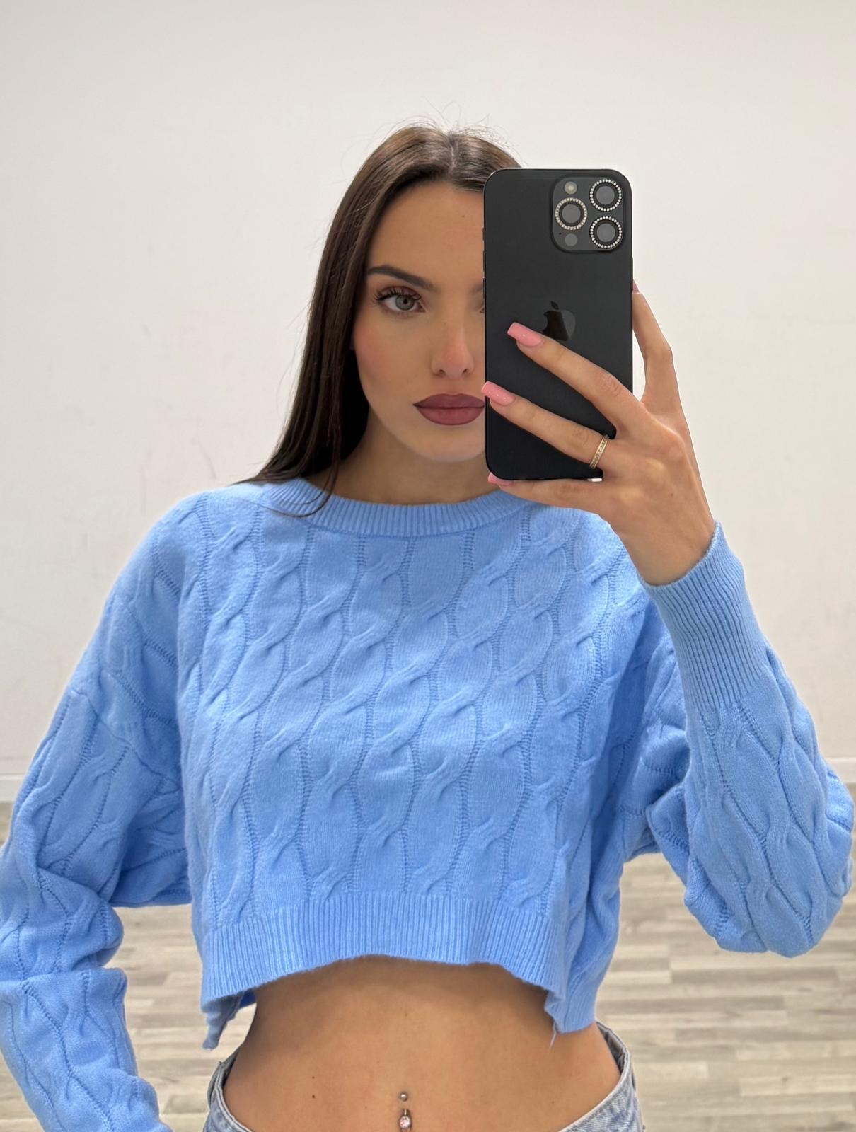 pull corto con treccie