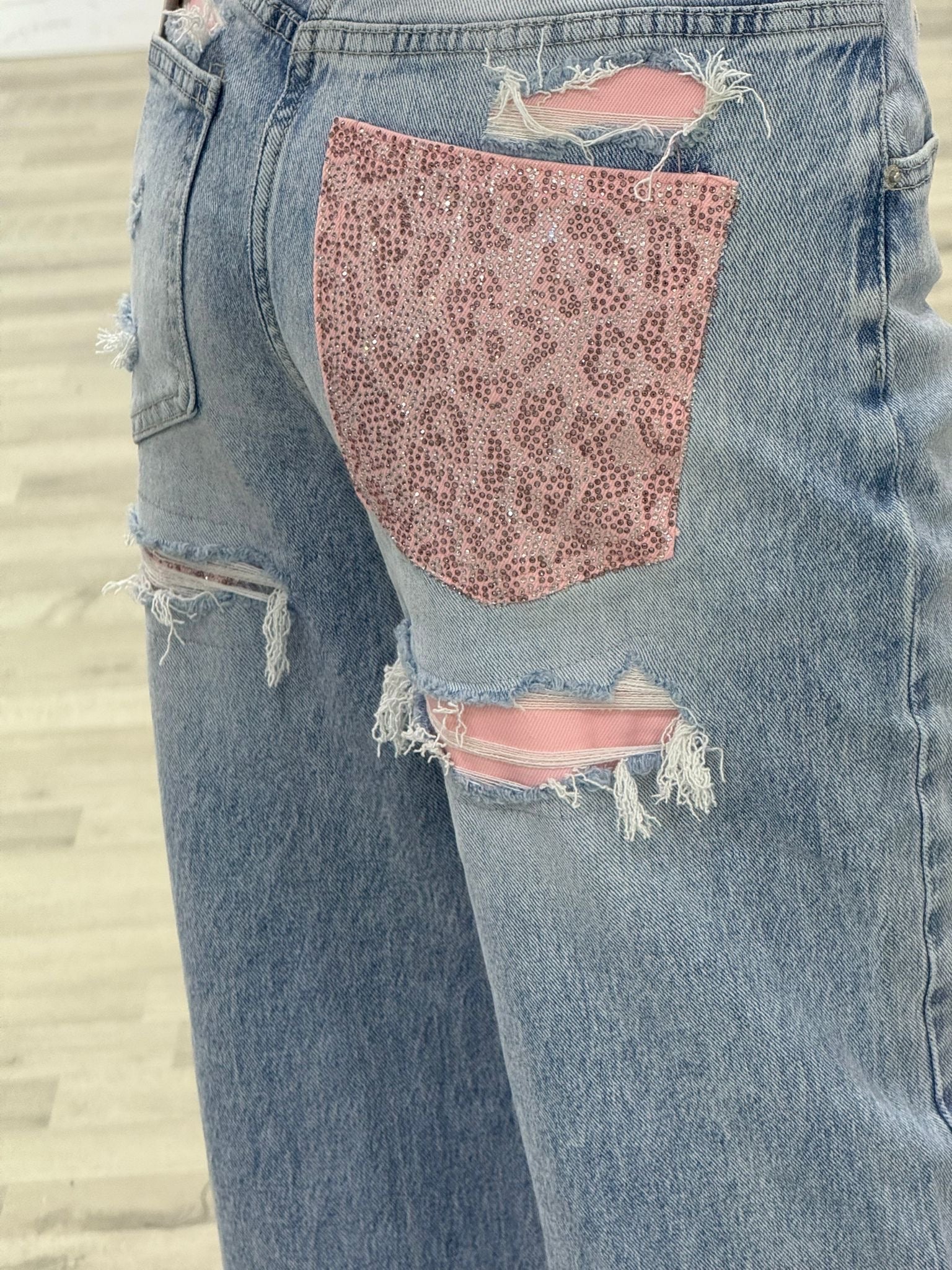 jeans con new tasca rosa