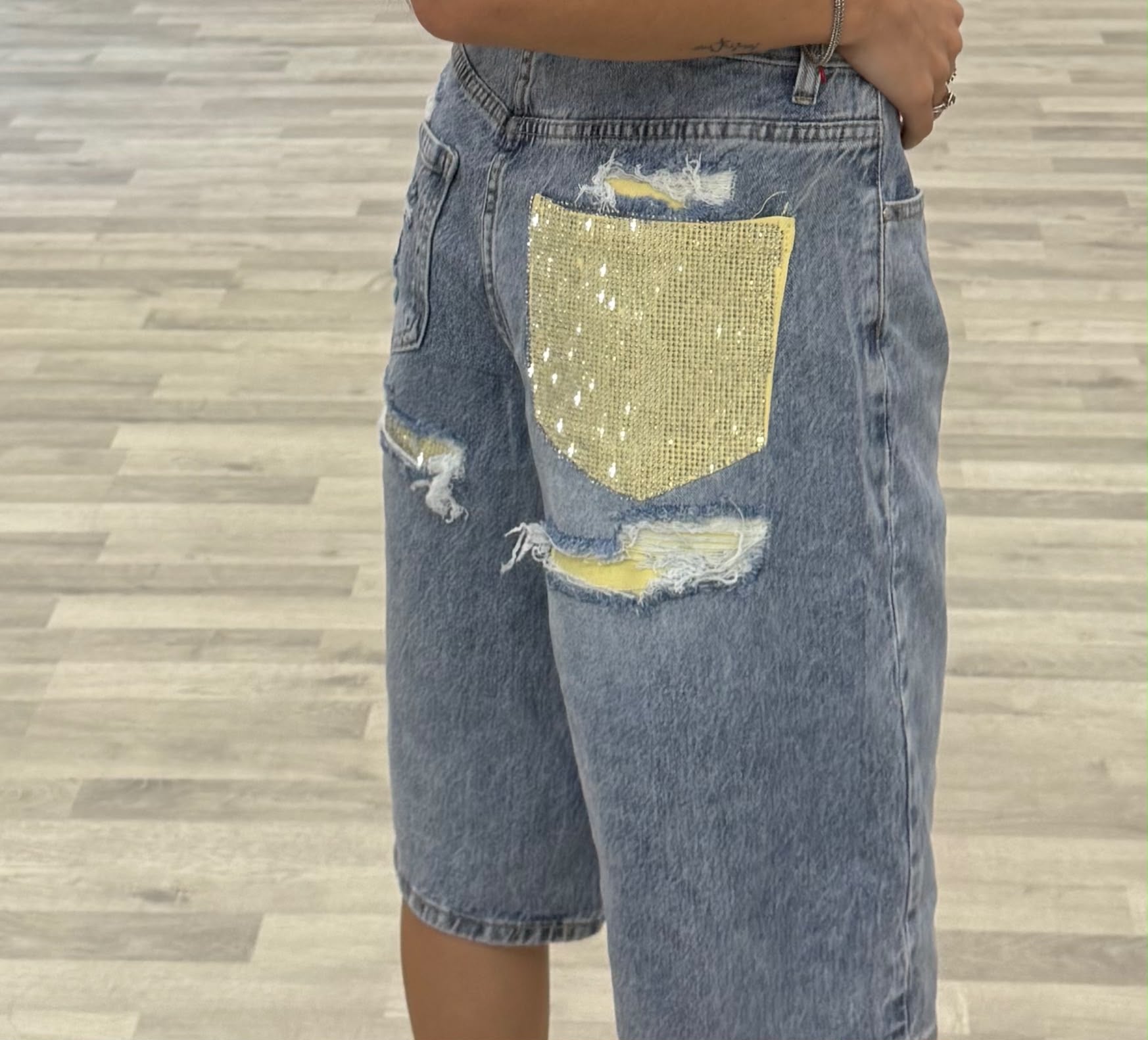 bermuda di jeans tasca gialla