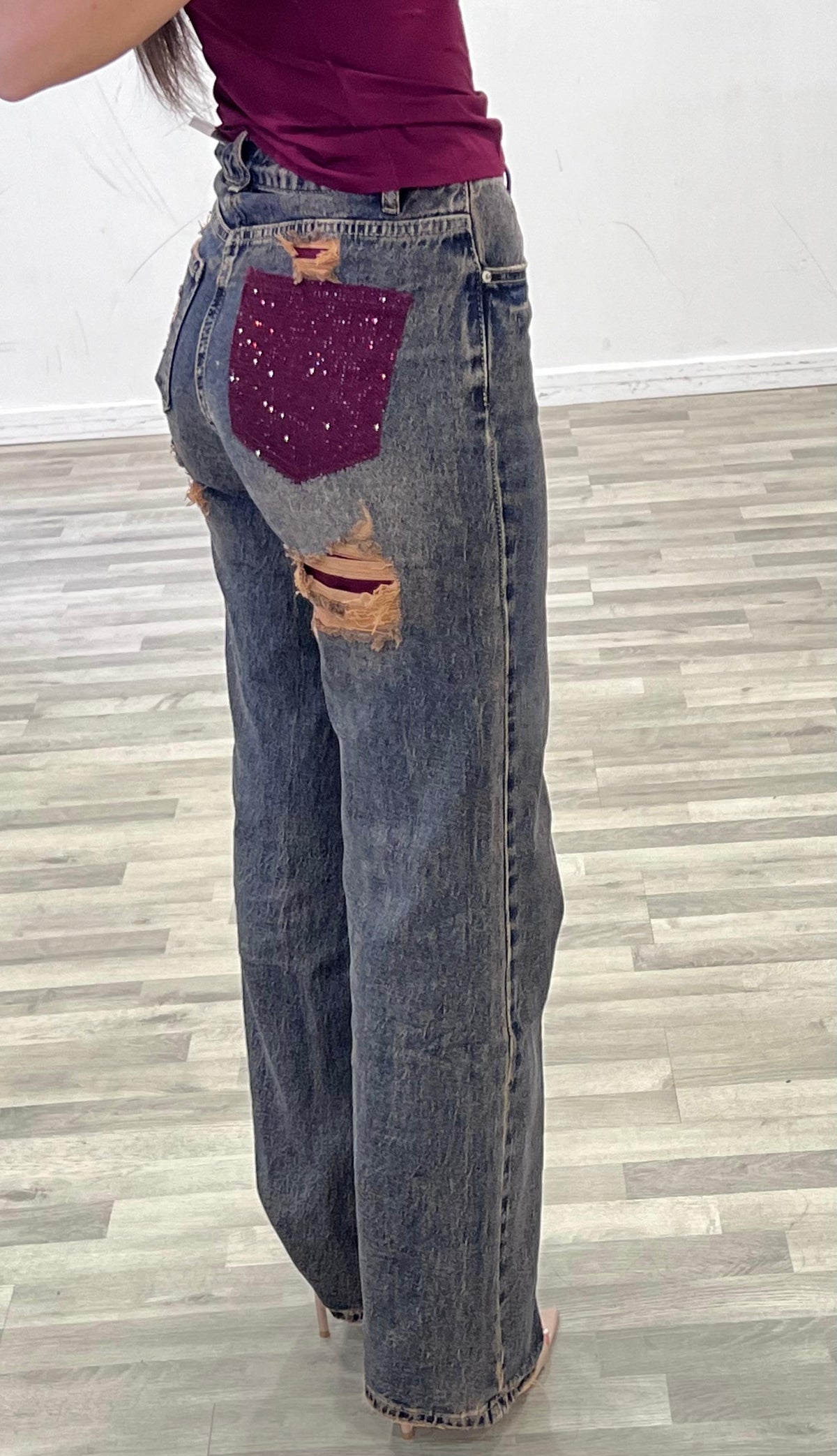 jeans con tasca bordo'in strass