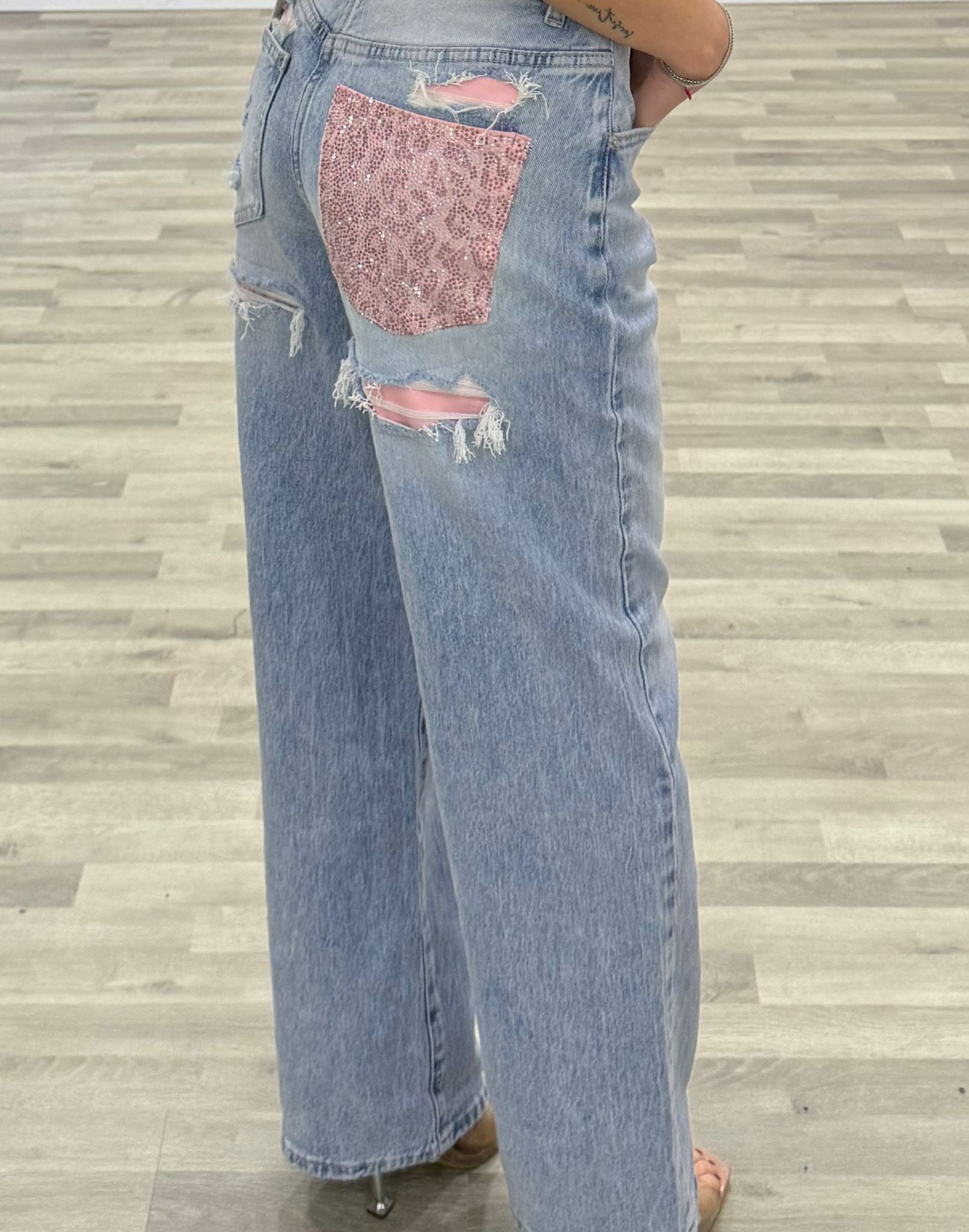 jeans con new tasca rosa