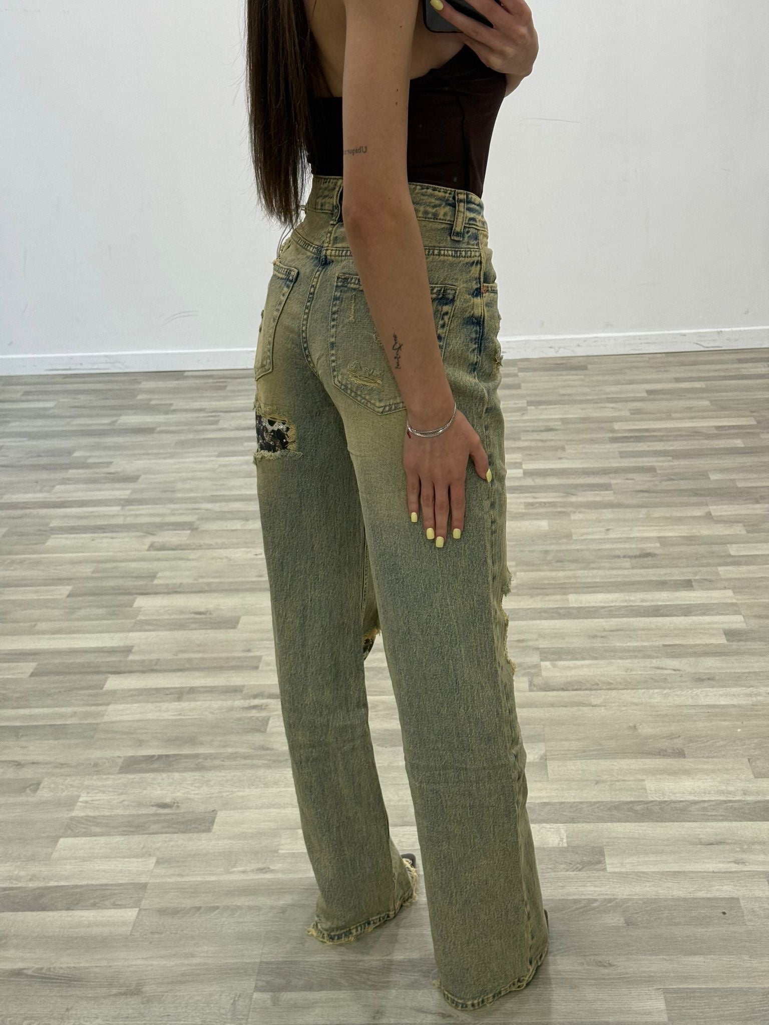 jeans sabbiato e maculato