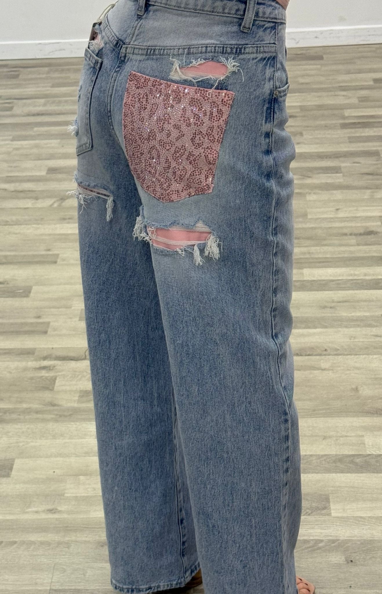 jeans con new tasca rosa