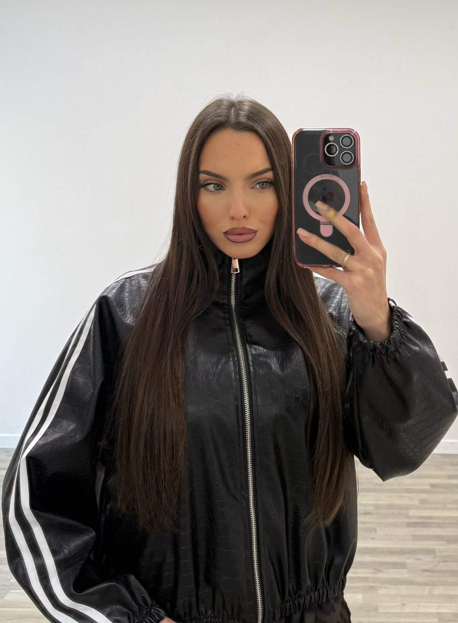 giubbino in ecopelle con righe laterali