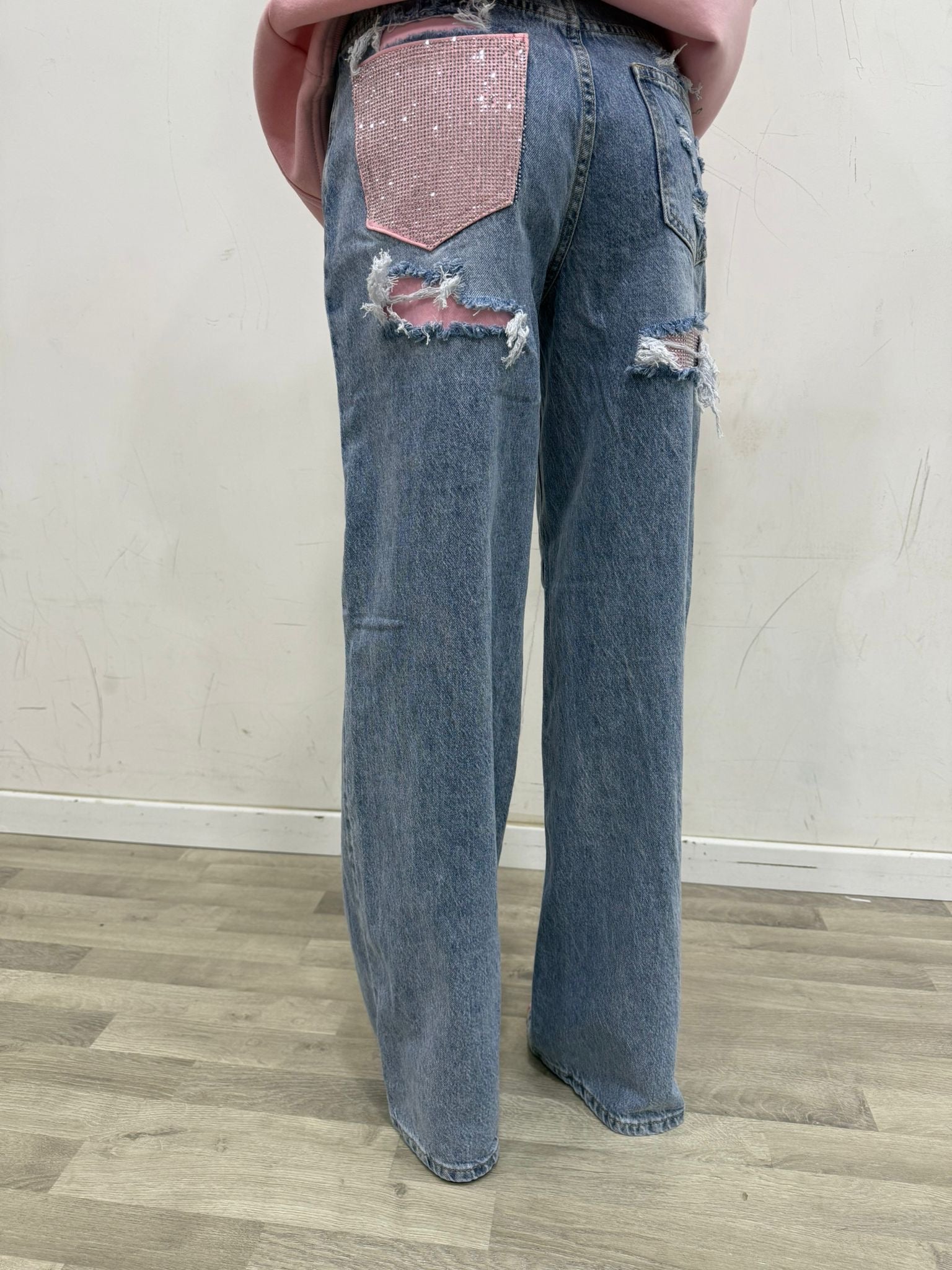 jeans con tasca in strass rosa