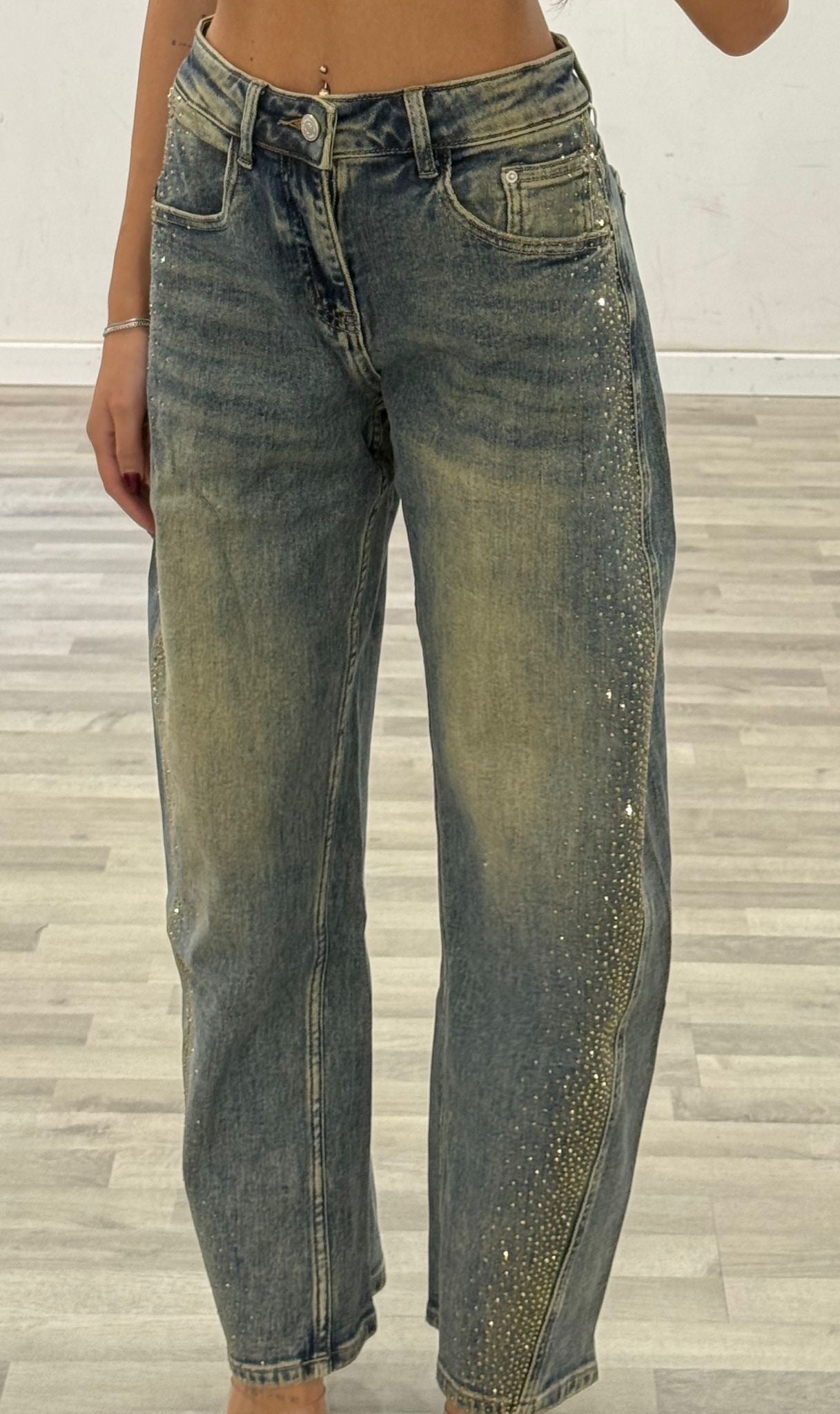 jeans con brillanti laterali